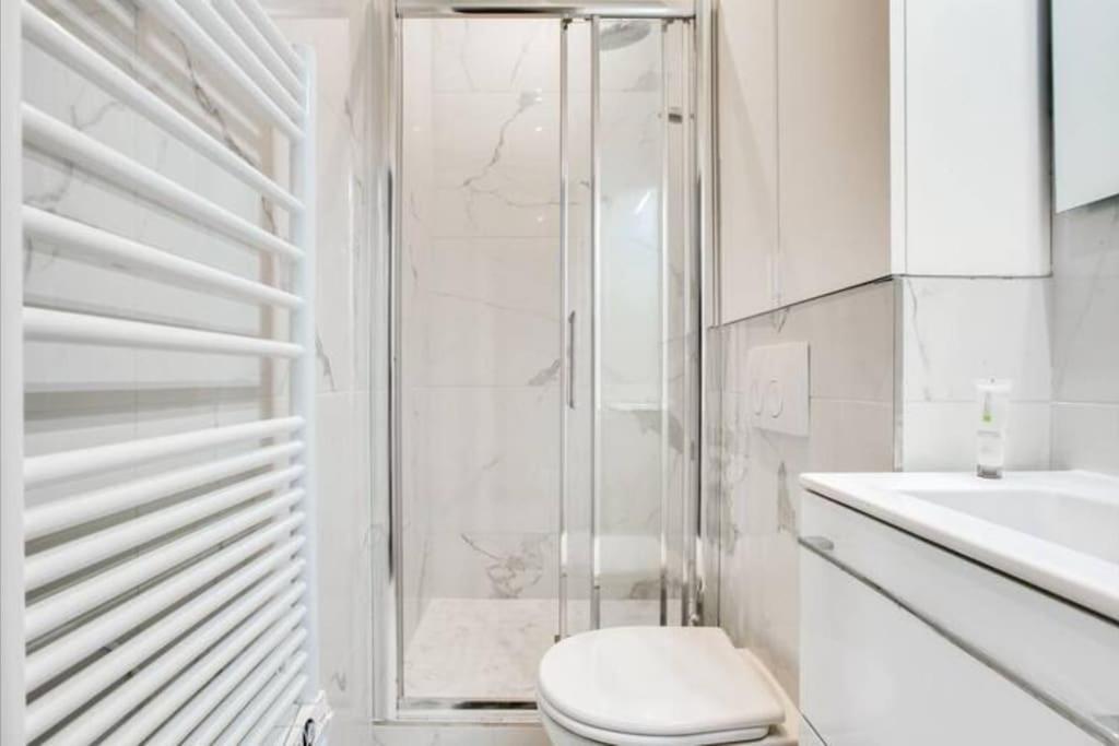 03 Tour Eiffel Appartement Pour 7 Personnes Paris Bagian luar foto