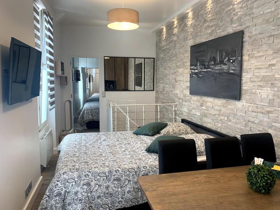 03 Tour Eiffel Appartement Pour 7 Personnes Paris Bagian luar foto